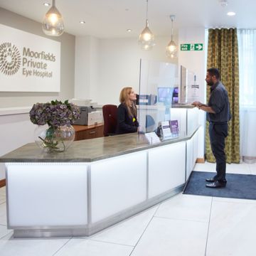 A patient arrives at Moorfields Private reception