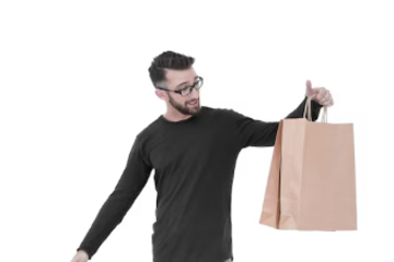 Person holding brown paper bags