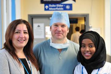 two females and one male member of Moorfields staff