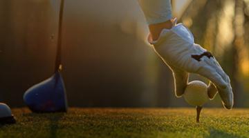 A person playing golf
