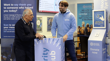 Two men at the charity hub in City Road