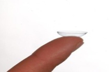 Contact Lens on a fingertip