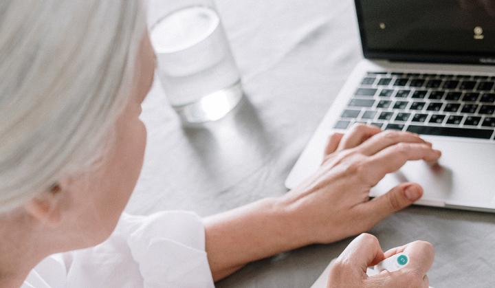 Woman at home with computer